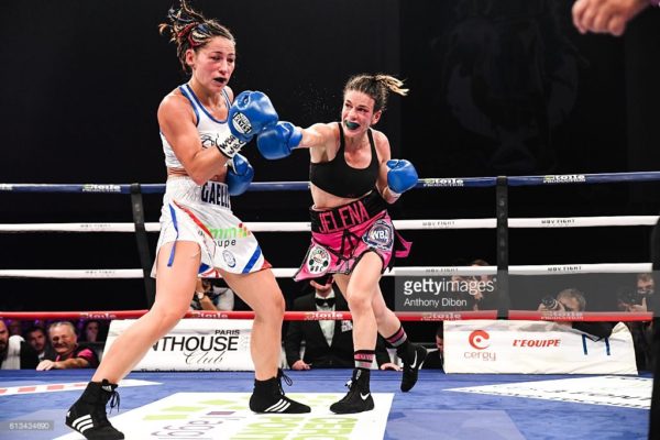 Mrdjenovich retained her titles via split decision over previously undefeated Gaëlle Amand.