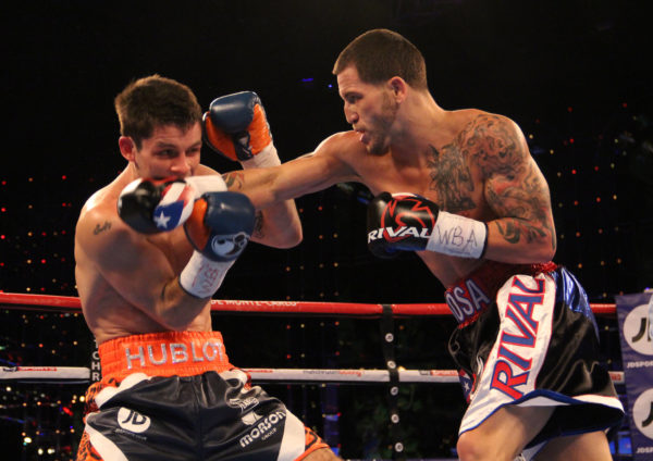 Jason Sosa retains his WBA super-featherweight world title with victory over Liverpool's Stephen Smith