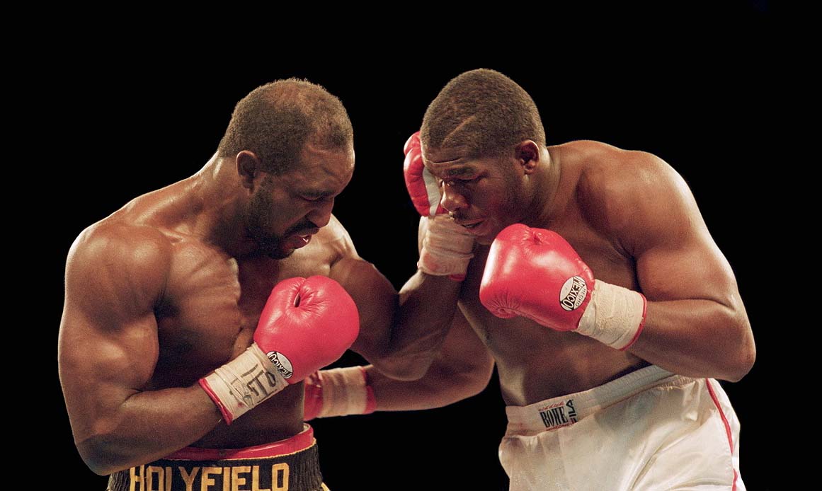 The three Holyfield-Bowe fights are among the greatest trilogies in history. (Holly Stein/Allsport) 