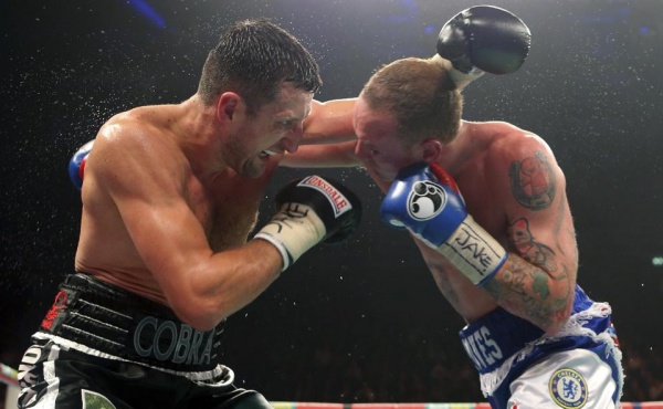 Photos: Froch retains super middleweight titles