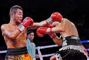 China’s Qiu Xiao Jun Retains WBA International Title