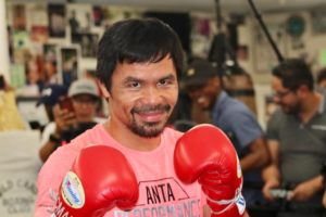 Pacquiao shows guns and Broner promises surprise in Los Angeles